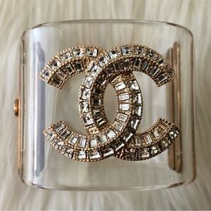 Clear plastic cuff statement bracelet with cc crystals
